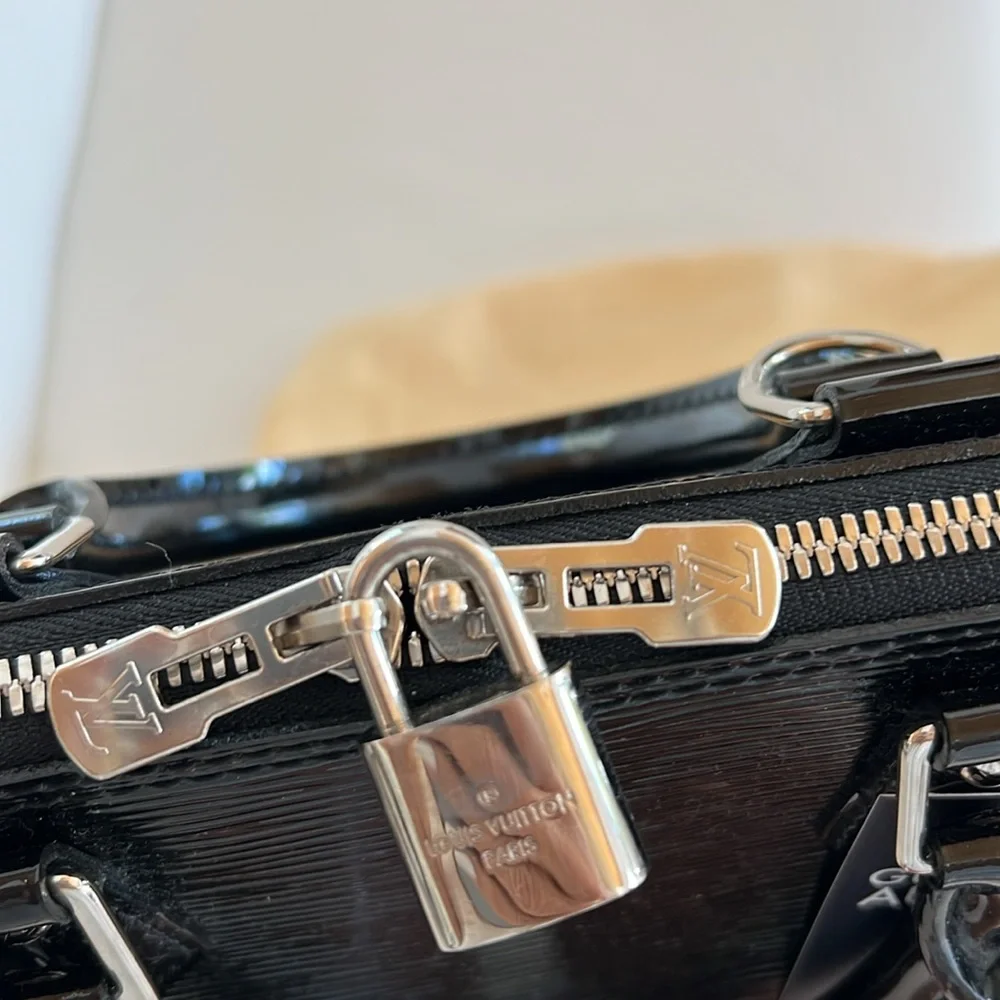 authentic $2850 Louis Vuitton Epi Electric Alma PM Satchel black patent leather